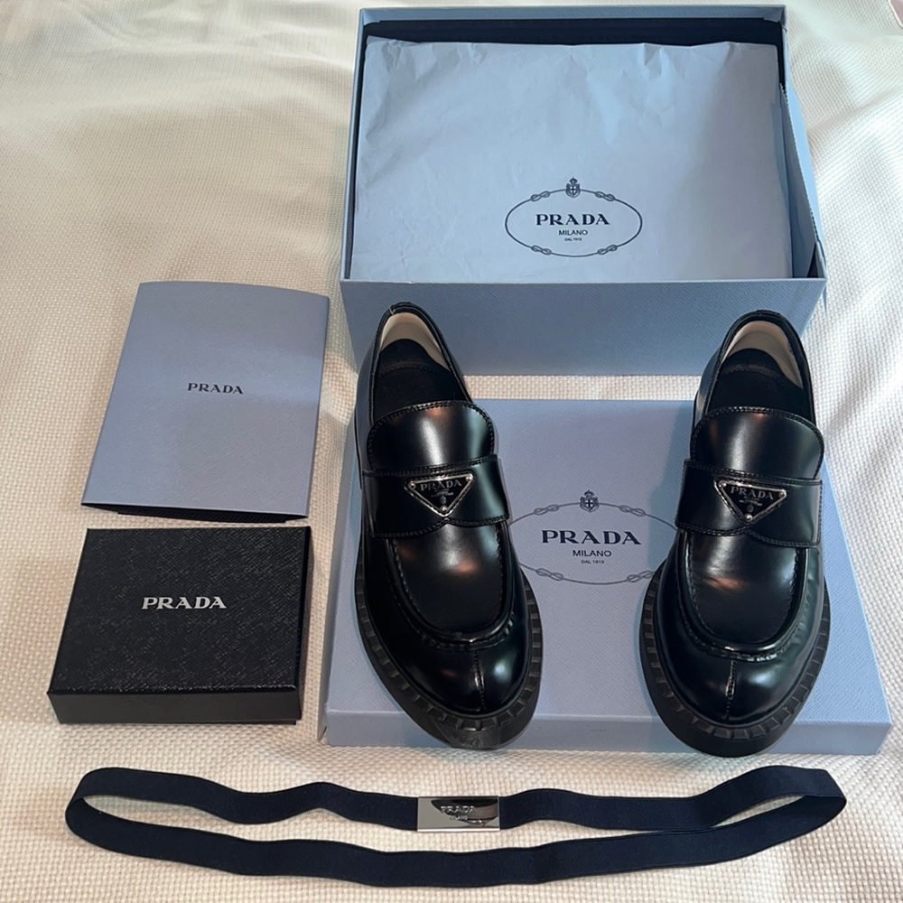 Prada chocolate brushed leather loafers (black).